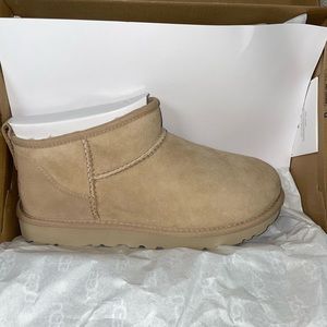 Size 8 brand new Ultra Mini Ugg boots. Driftwood color. Never worn!